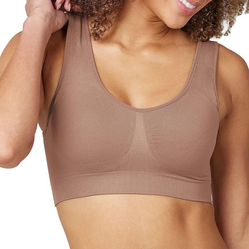 a model wearing a spanx comfort bra