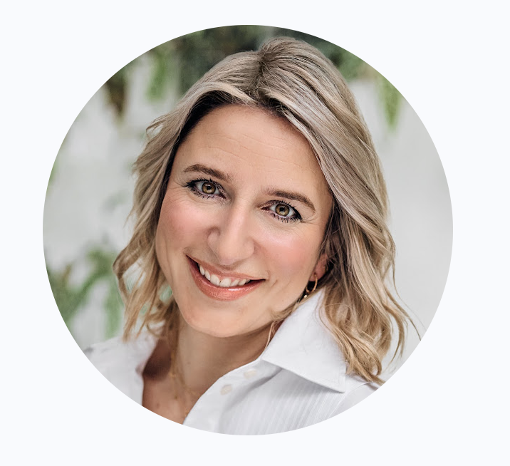 A headshot of woman&home magazine editor Hannah Fernando wearing a white shirt